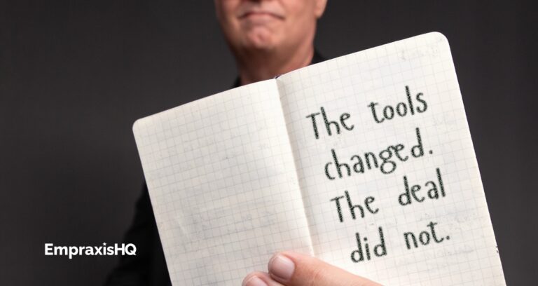 Tim Miles holding an open pocket notebook, on which is written "The tools changed. The deal did not."