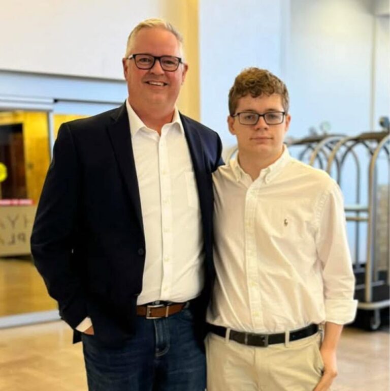 Picture of Tim and his son Will on a business trip together in Minneapolis in 2025.