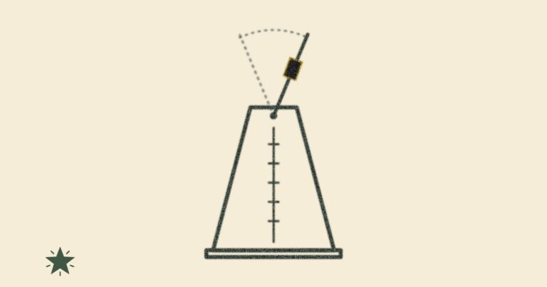 notebook with sketch of a metronome